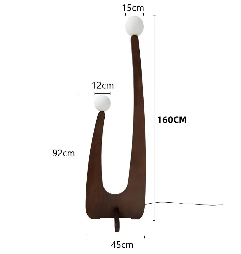 Modern arc floor lamp showing elegant cord management integrated with interior design