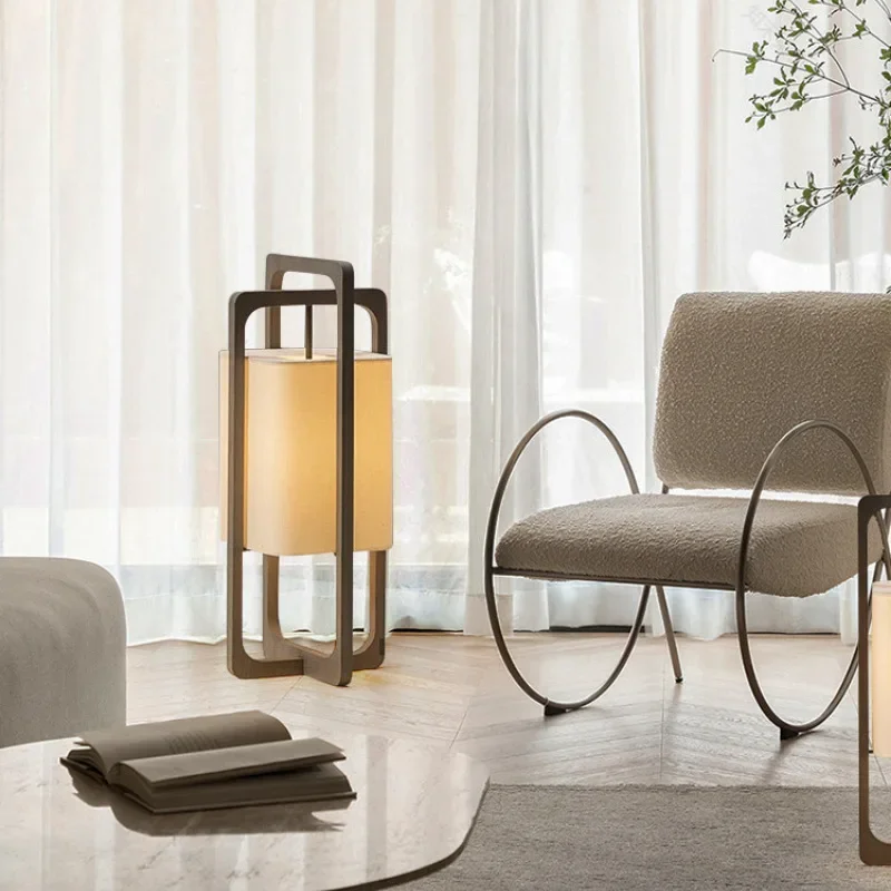 Asian-inspired wooden arc floor lamp creating a cozy atmosphere in a reading nook