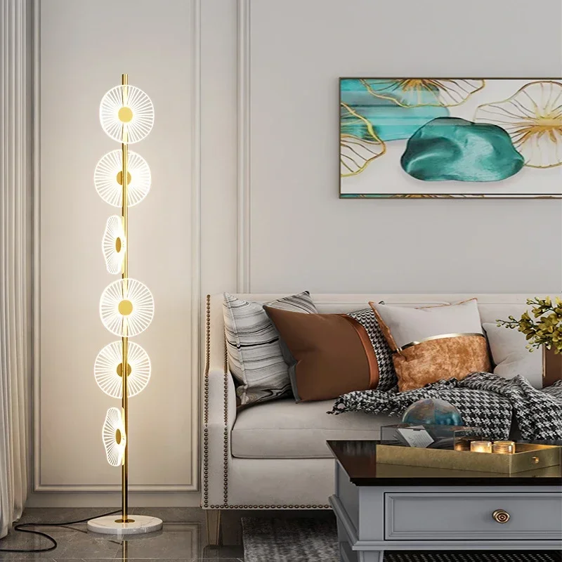 Elegantly positioned oversized arc floor lamp illuminating a living room sofa arrangement