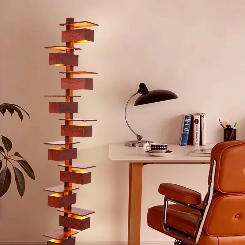Person assembling a minimalist black arc floor lamp showing proper technique