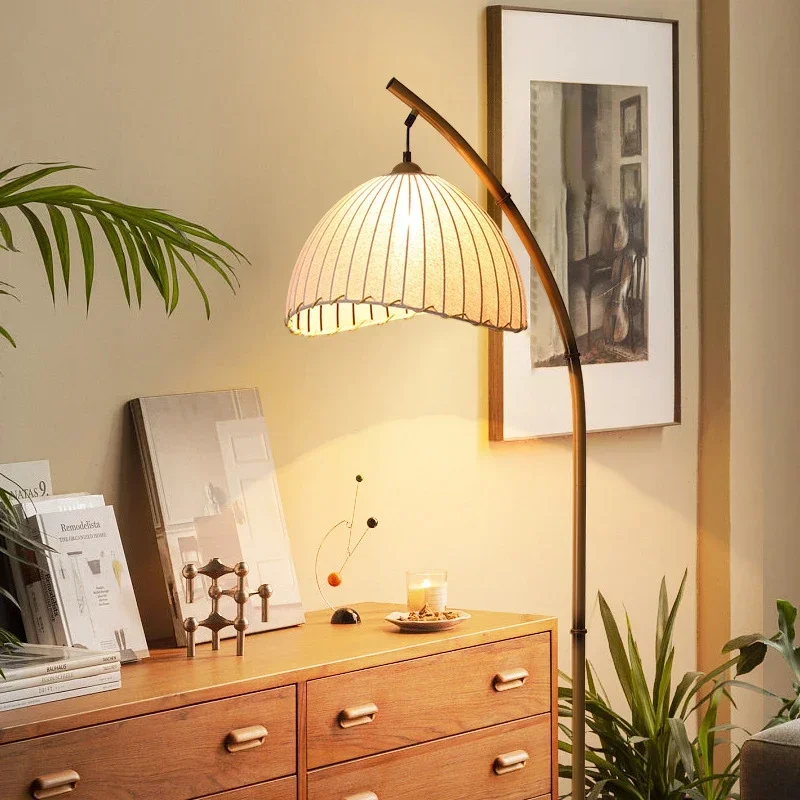 Oversized arc lamp perfectly positioned over a modern seating arrangement