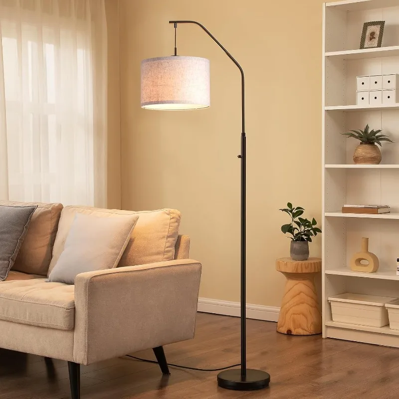 Arc floor lamp with cord management system handling excess cord length