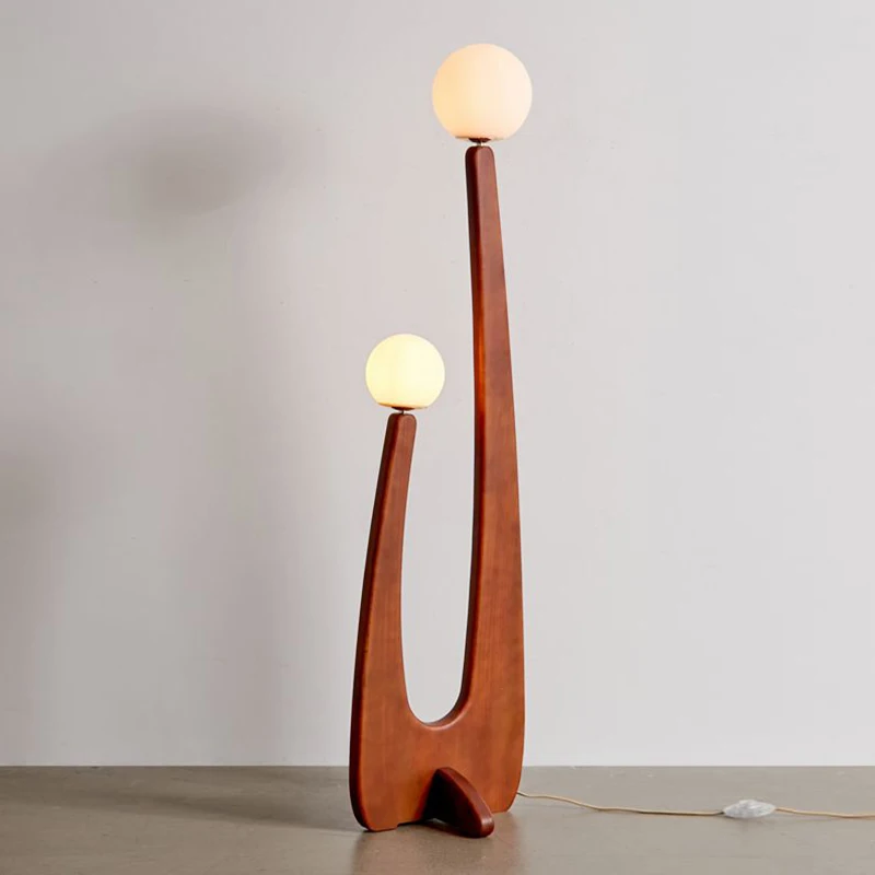 Minimalist arc lamp with soft diffused light solving common lighting challenges